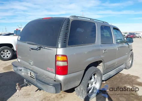 2003 GMC Yukon Sle z USA, uszkodzony, nr VIN 1GKEC13Z23J284733